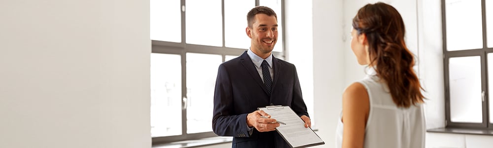 Man and woman discussing lease of property